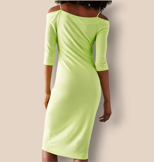 Green dress with a plain background
