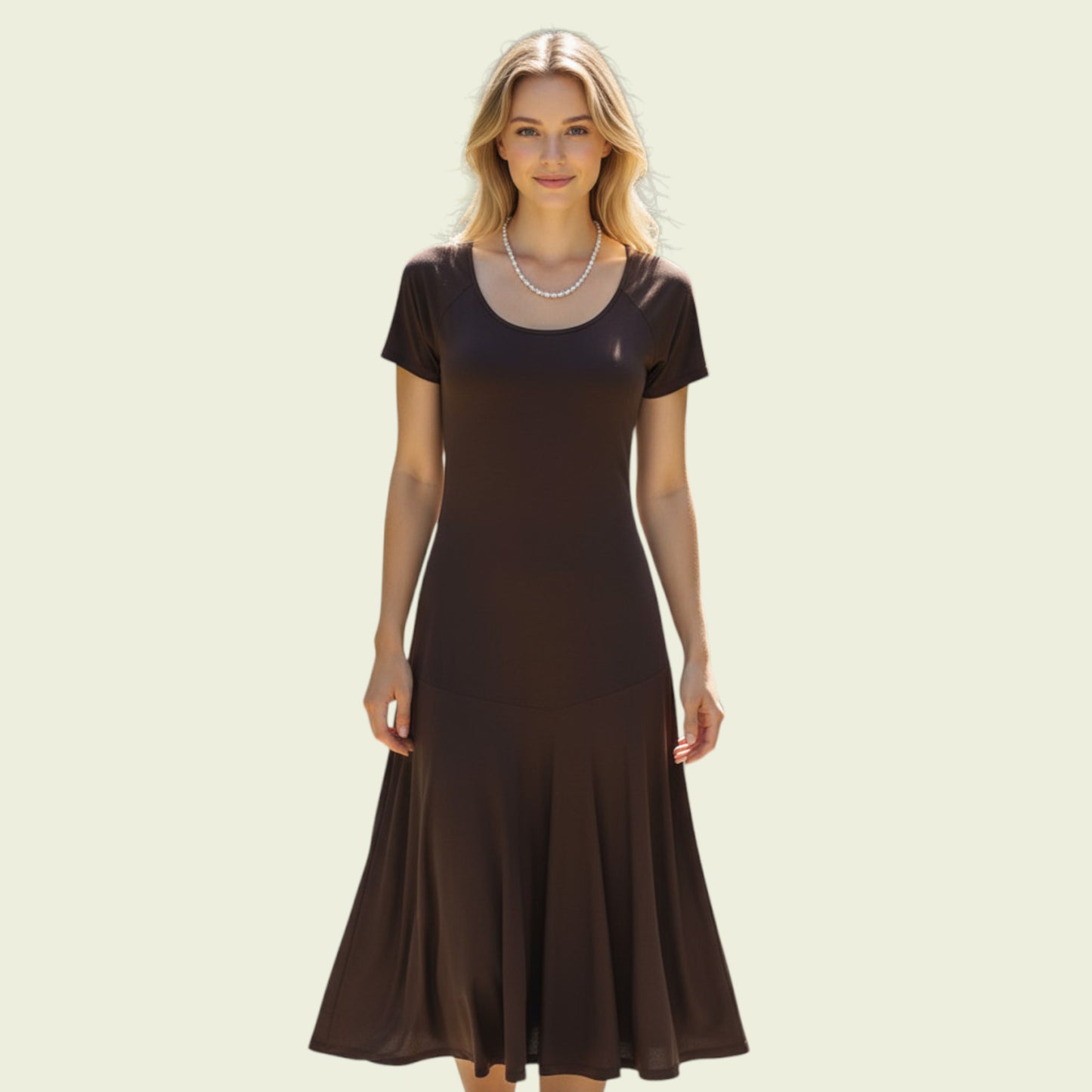 Woman wearing a brown dress on a beige background