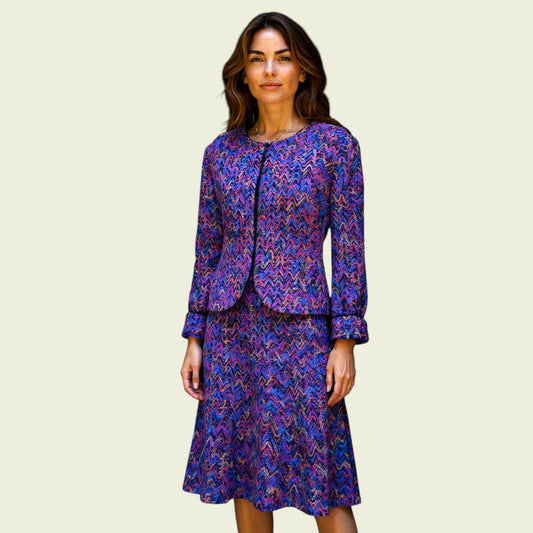 Woman mauve patterned suit on a beige background