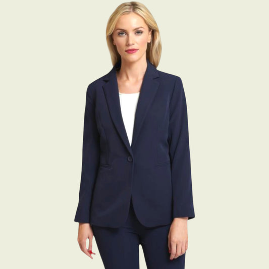 Woman wearing a navy blue suit jacket on a beige background