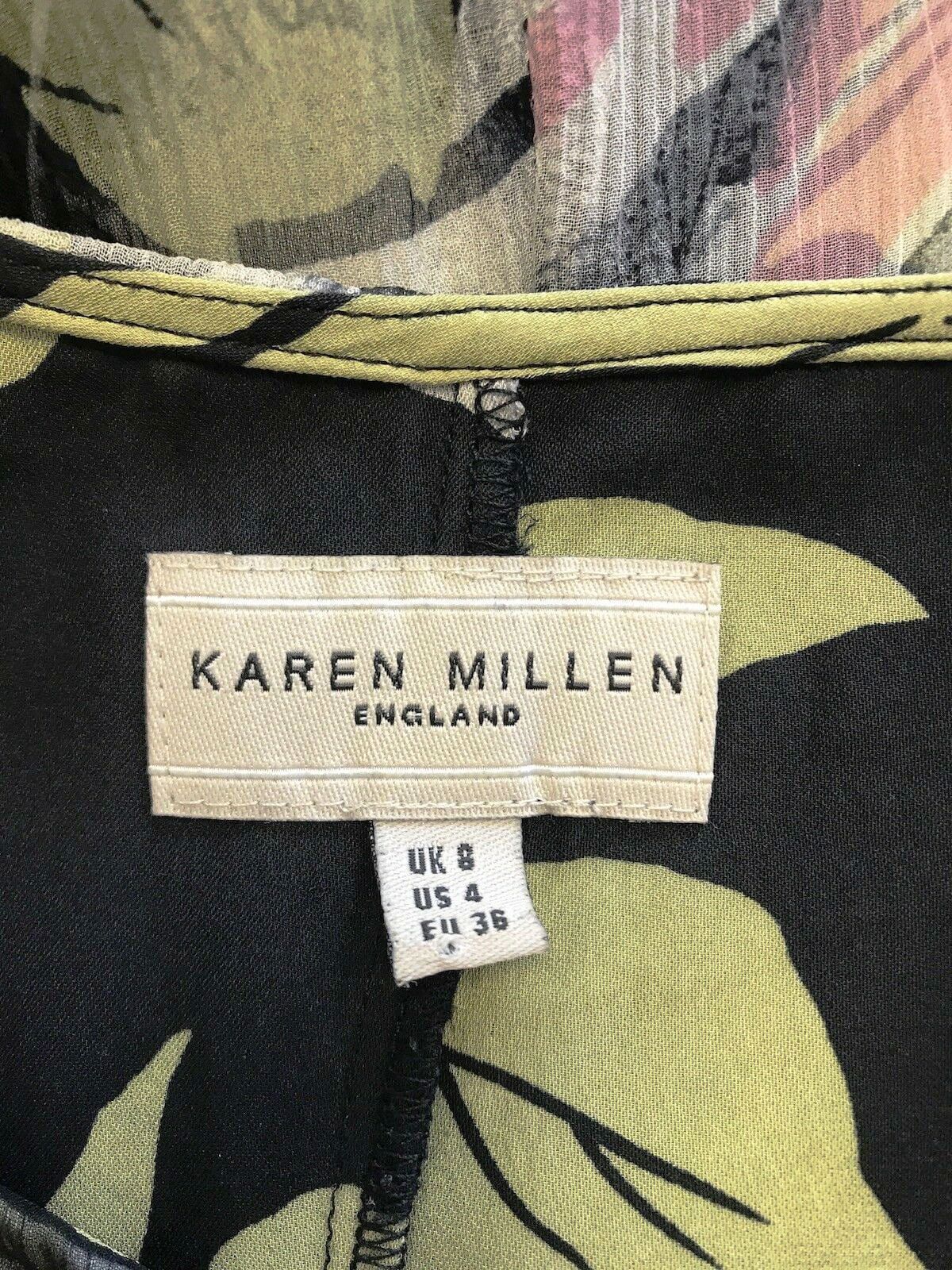 Label on a garment with 'Karen Millen' branding and size information.