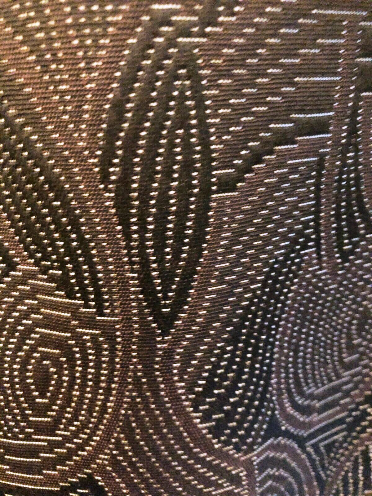 Close-up of a textured fabric with intricate patterns