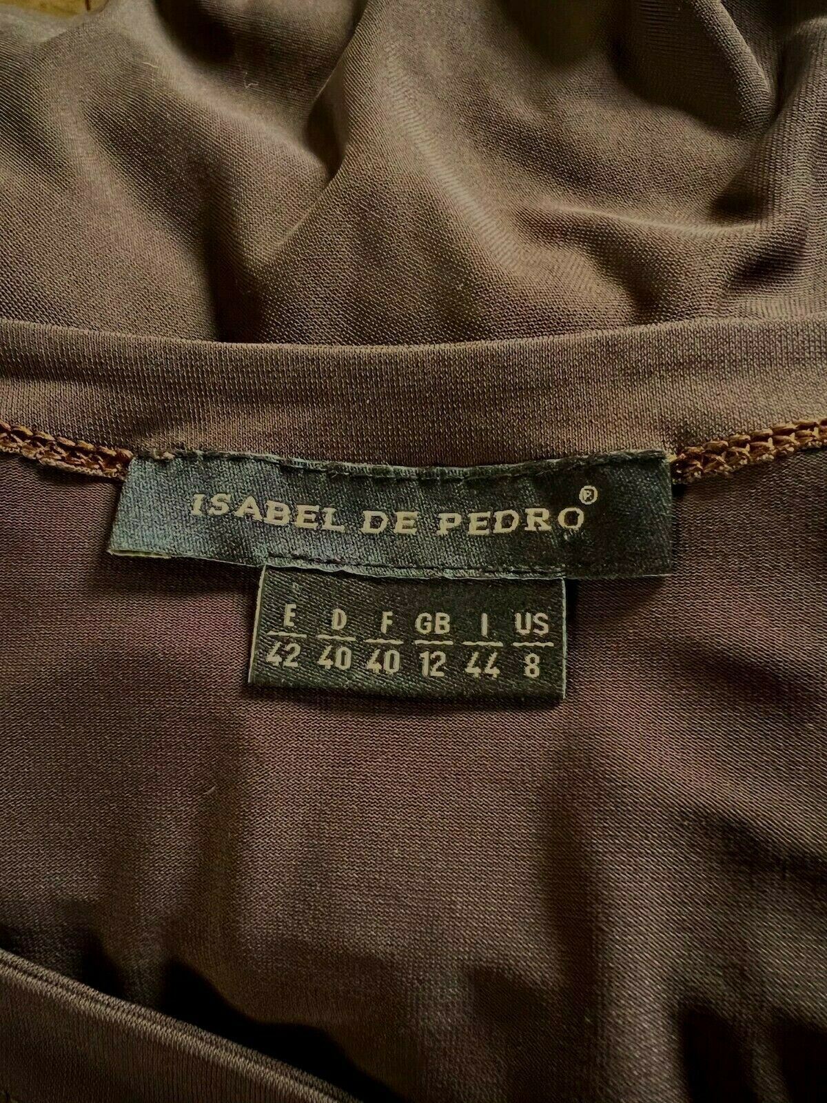 Close-up of a brown garment with an Isabel de Pedro label.