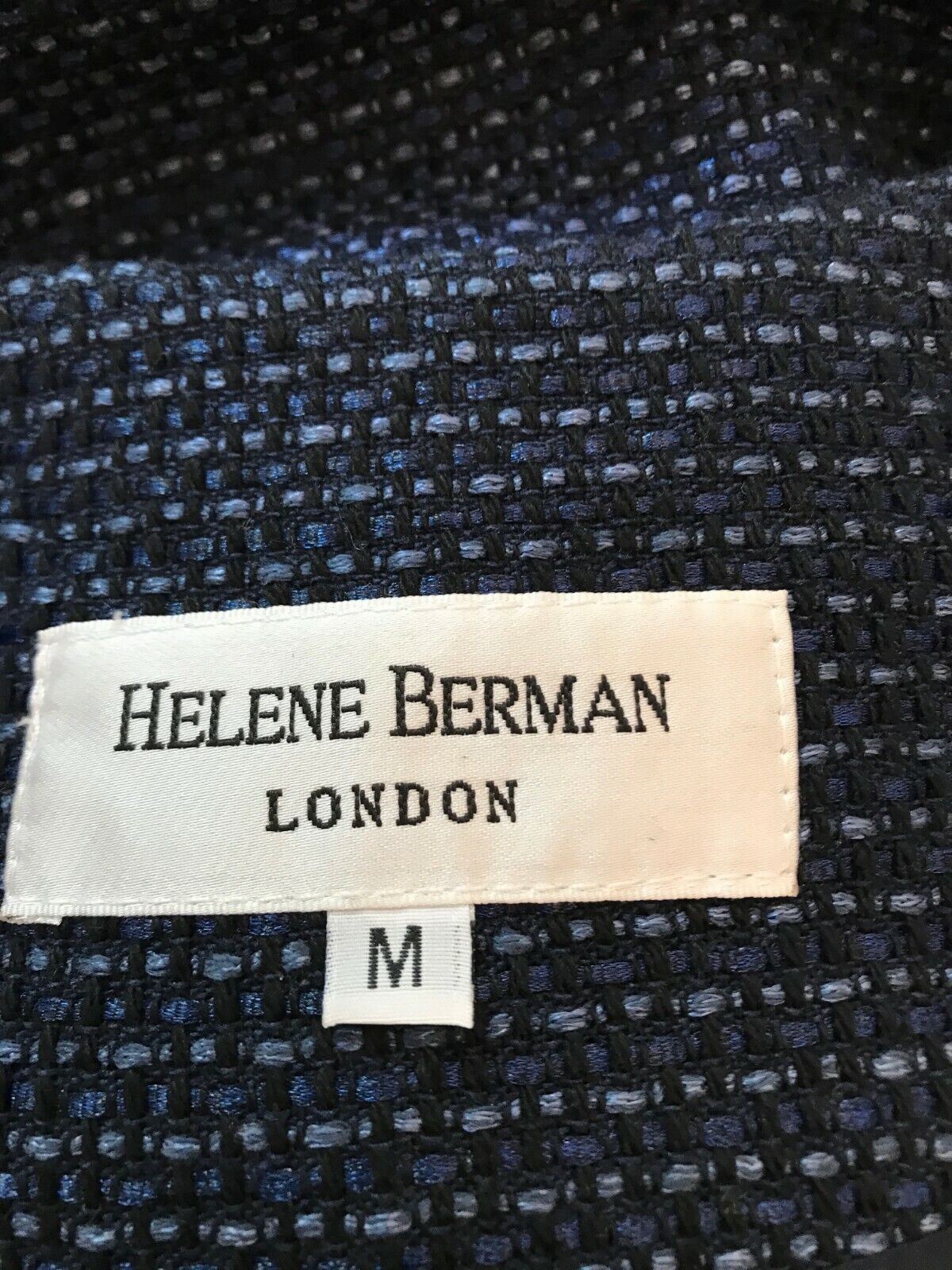 Label with 'Helene Berman London' on a textured fabric background