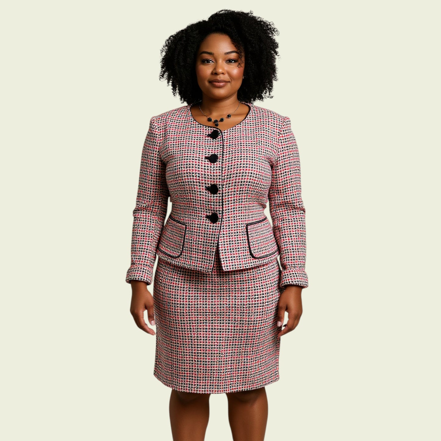 Woman wearing a checkered suit on a beige background