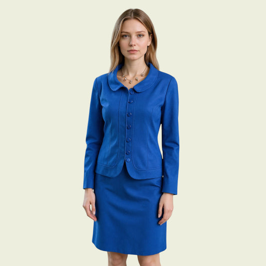 Woman wearing a blue suit on a beige background