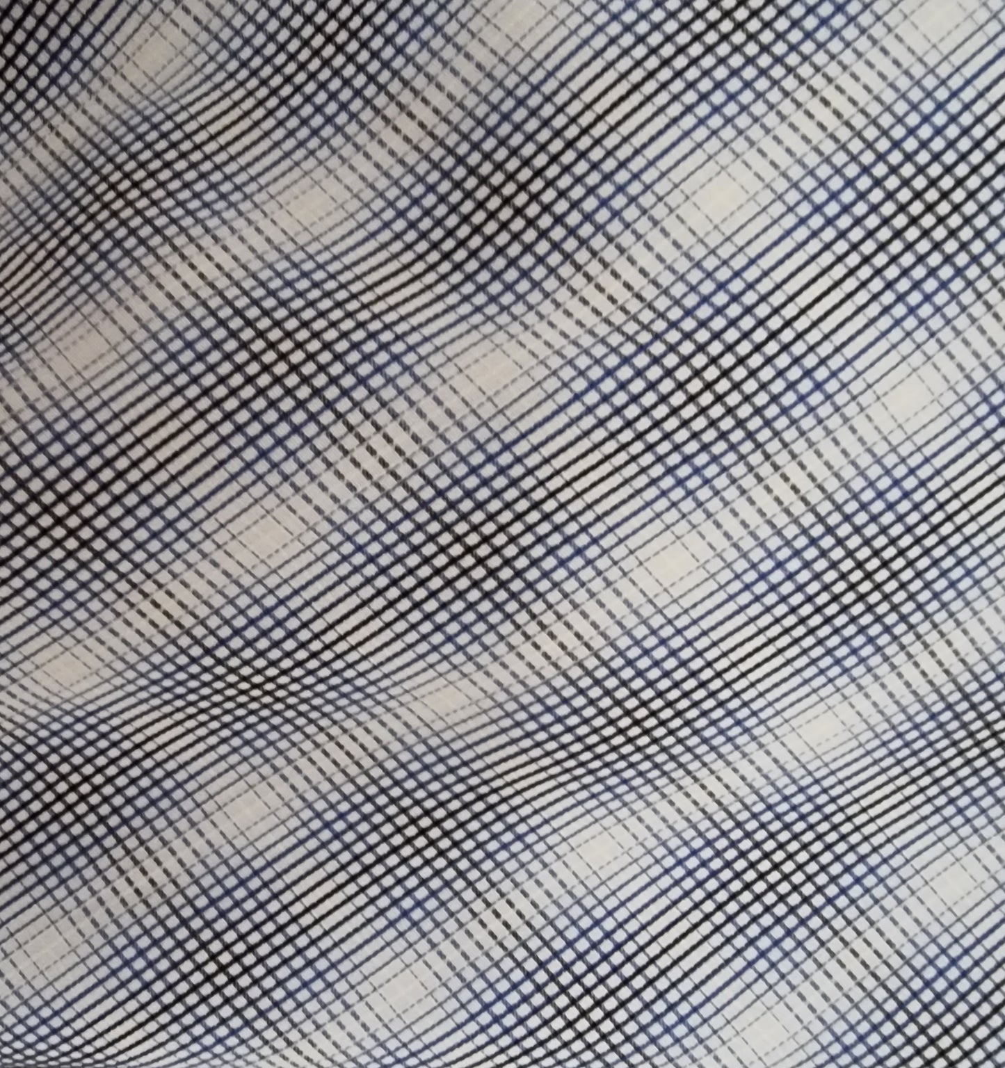 Plaid pattern fabric swatch in blue and beige