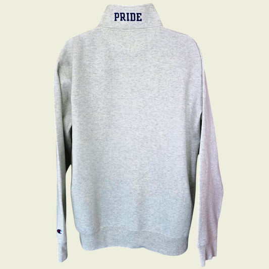 Gray sweater with 'PRIDE' text on a beige background