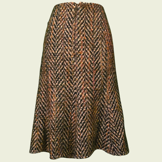 Brown tweed skirt on beige background