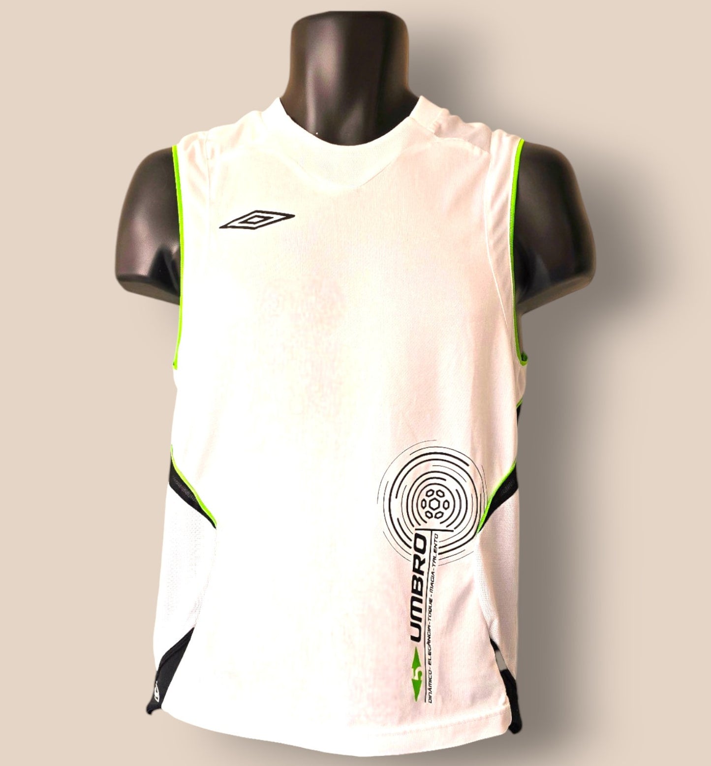 White sleeveless sports jersey with green accents on a mannequin against a beige background