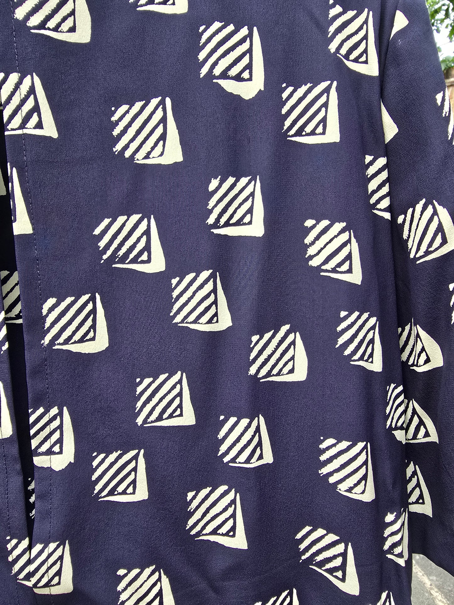 Navy blue fabric with white geometric pattern