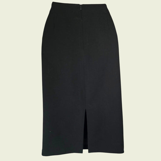 Black pencil skirt on a beige background