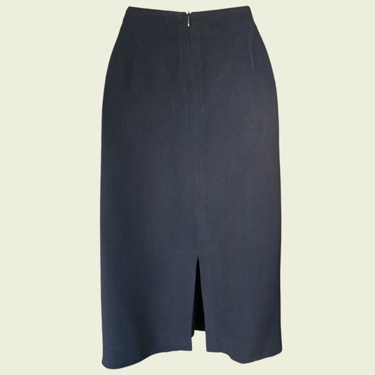 Black pencil skirt on a beige background