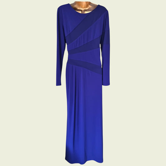 Blue dress with long sleeves on a beige background