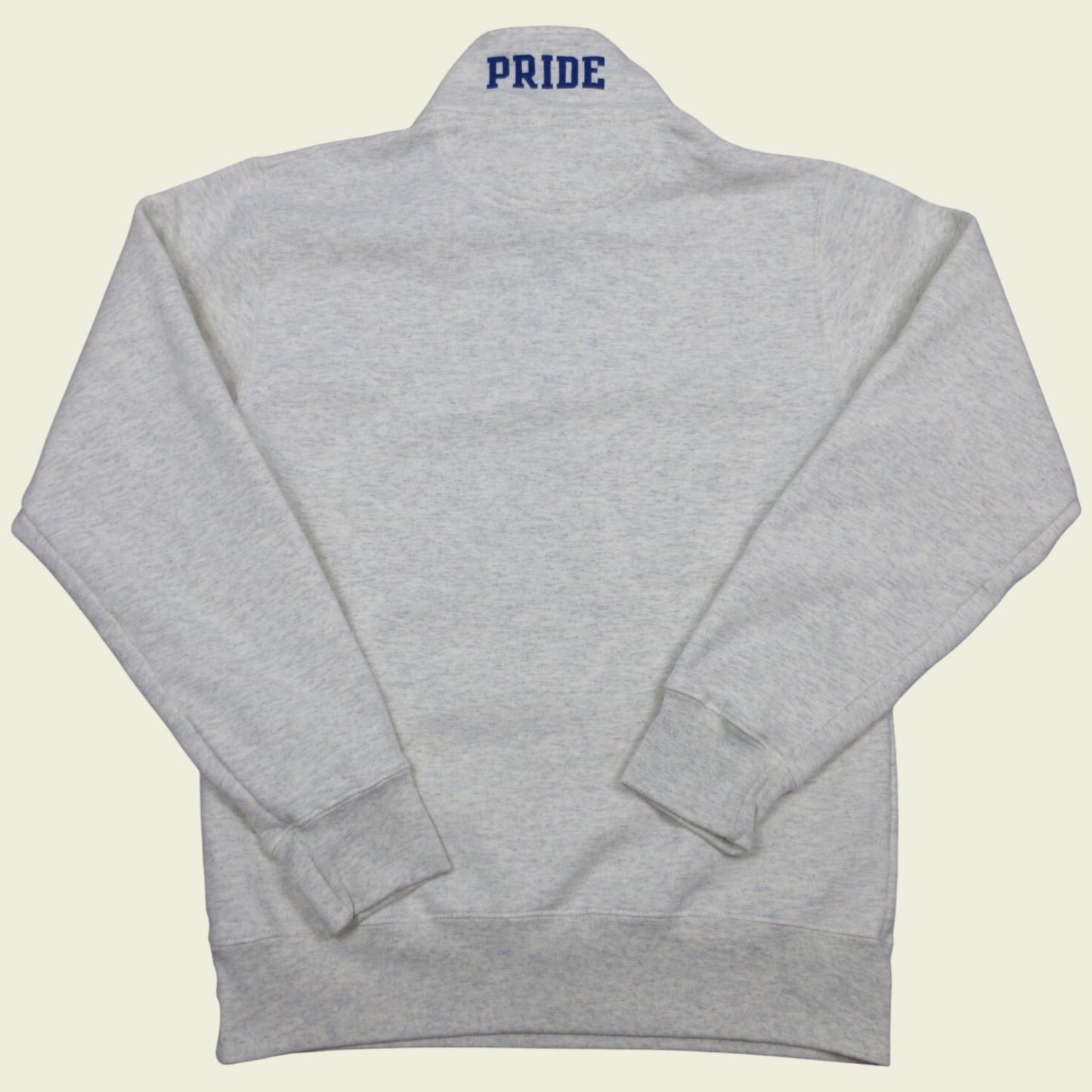 Gray sweatshirt with 'PRIDE' text on the back against a beige background