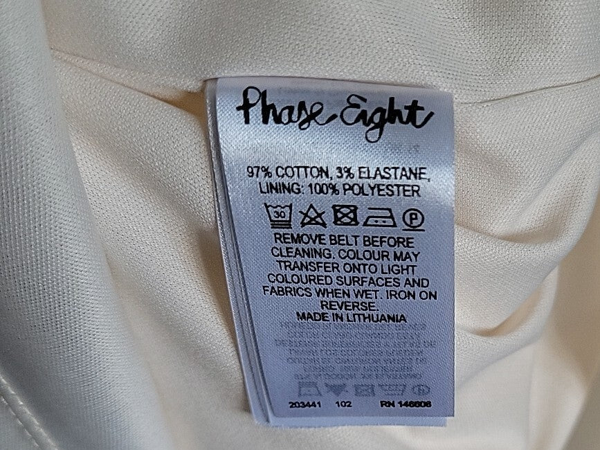 Clothing label with brand name 'Phase Eight' on a white fabric background