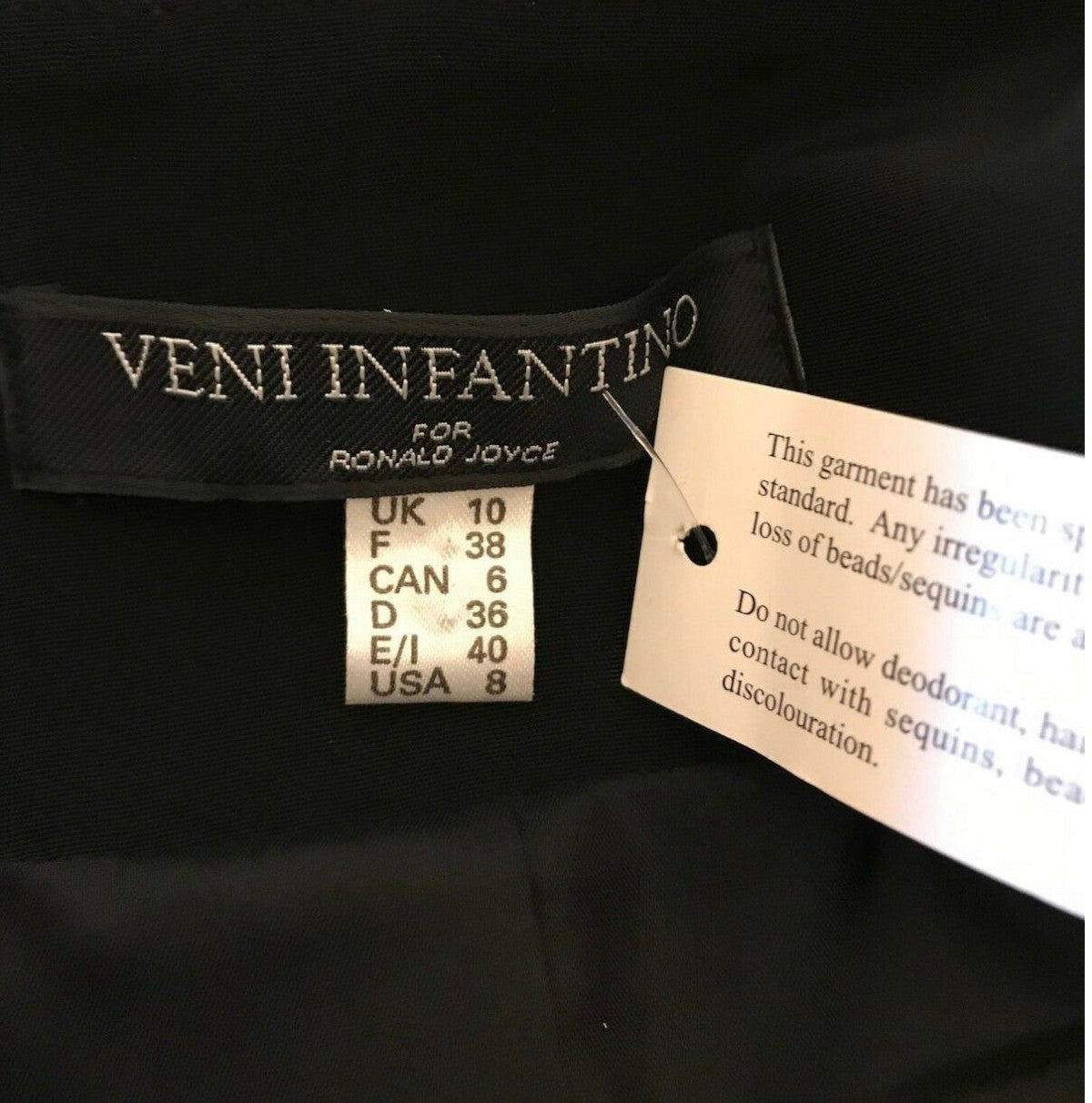Veni Infantino label on a garment with size chart and care instructions.