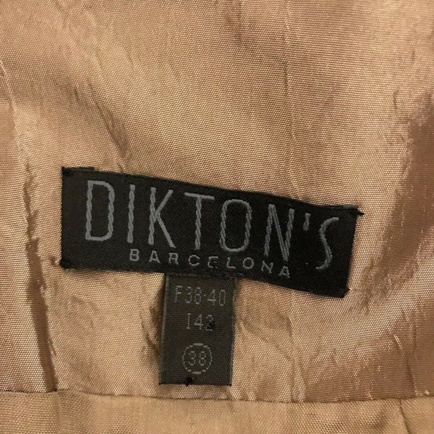 Dikton's Barcelona label on beige fabric
