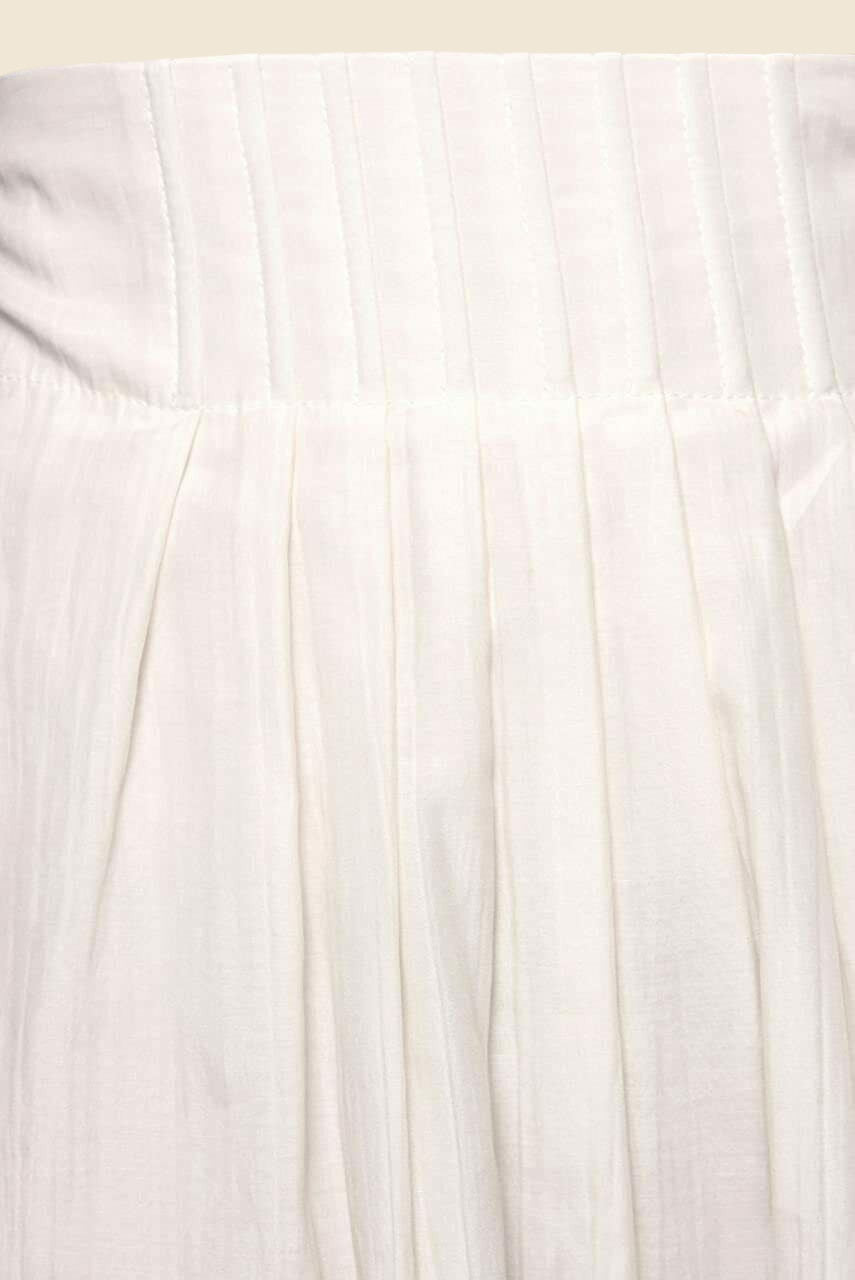 Close-up of a cream fabric with subtle texture