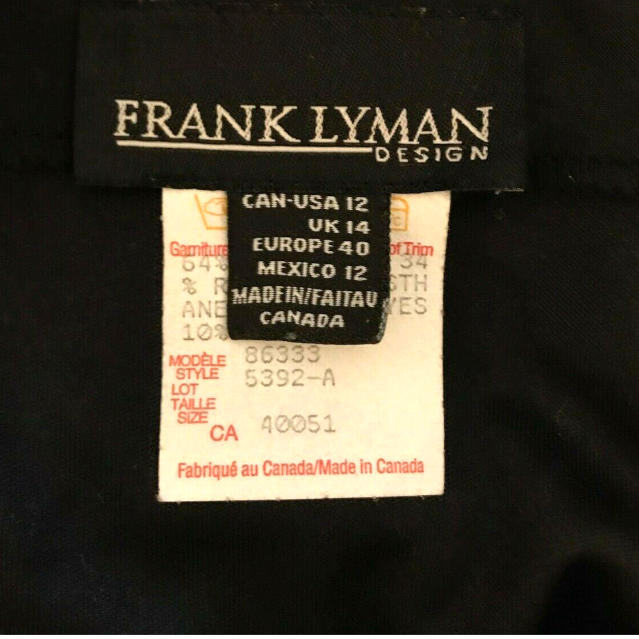 Clothing label with 'Frank Lyman Design' on a black background