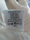 Label with text and symbols on a white background