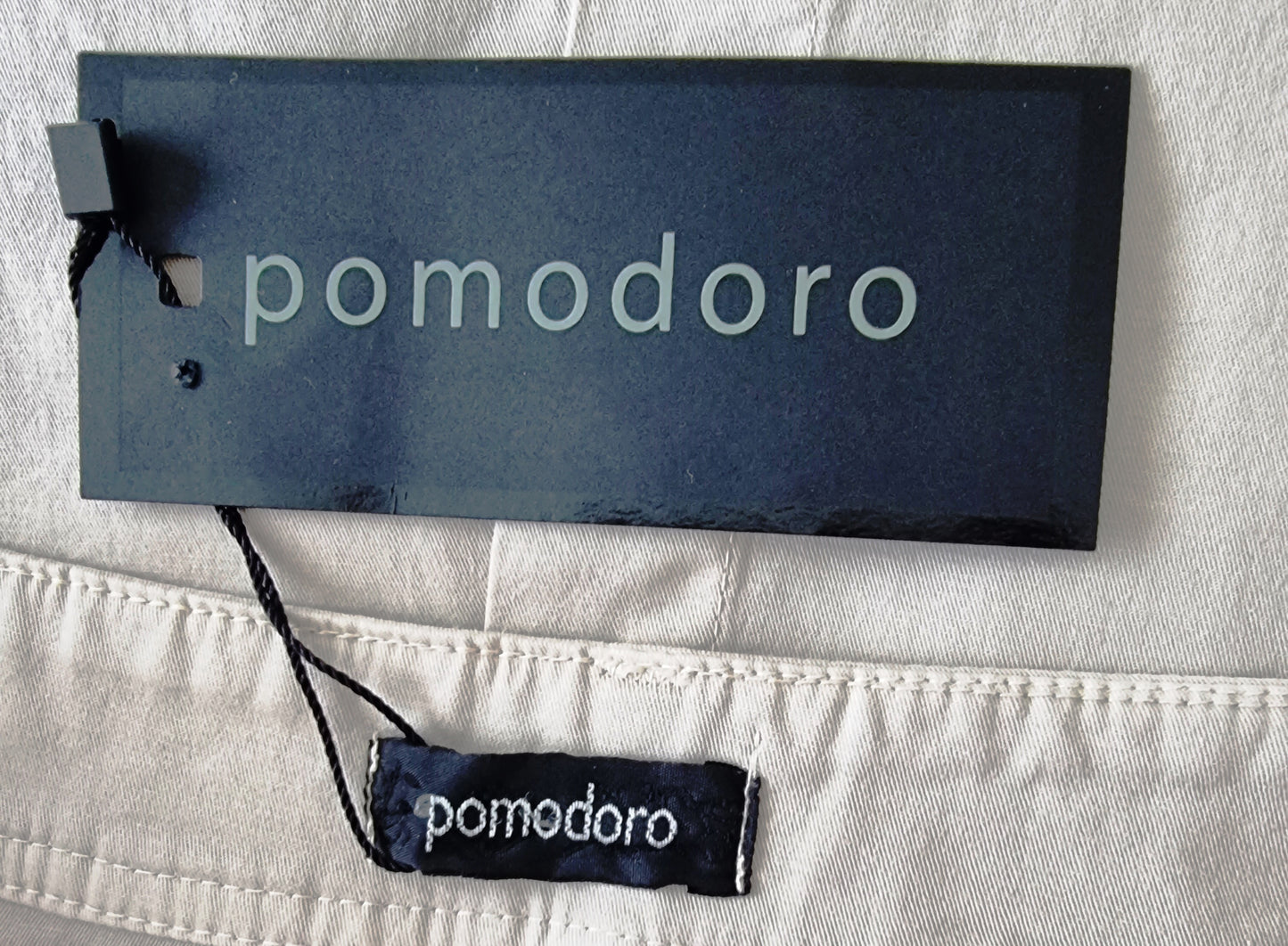 Pomodoro brand label on a piece of clothing