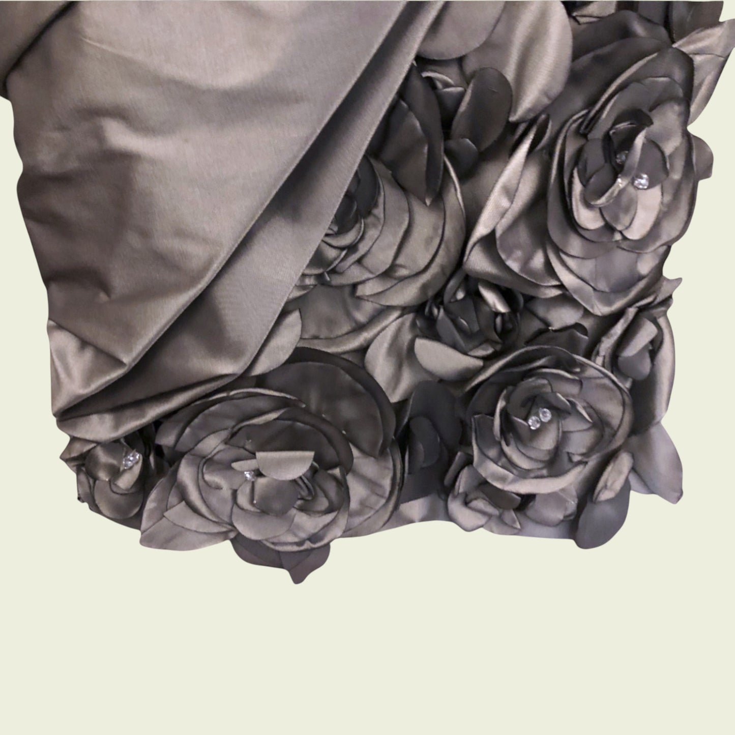Gray floral arrangement on a beige background