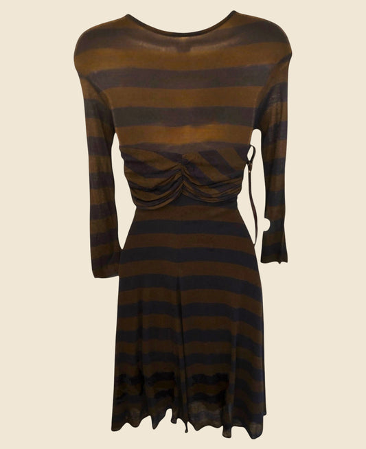 Brown and blue striped dress with a ruched waist on a beige background