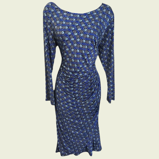 Blue patterned dress on a beige background
