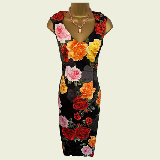 Floral dress on a mannequin with a plain background