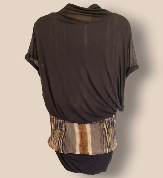 Dark brown top with a striped pattern at the bottom on a beige background