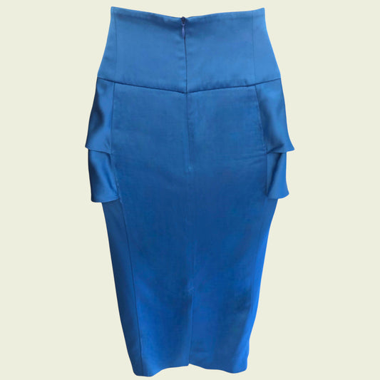 Blue skirt with ruffled layers on a beige background