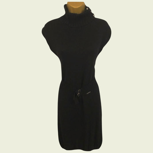 Black dress on a mannequin against a white background