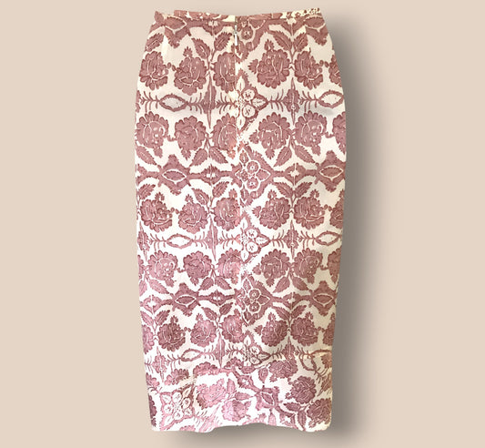 Skirt with pink floral pattern on a beige background