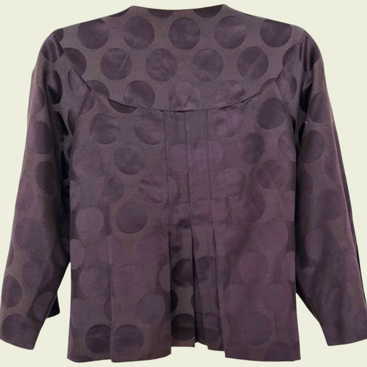 Brown jacket on a beige background