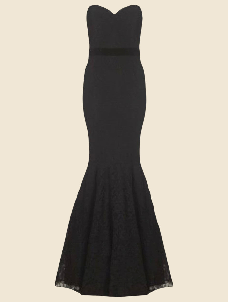 Black evening gown on a beige background