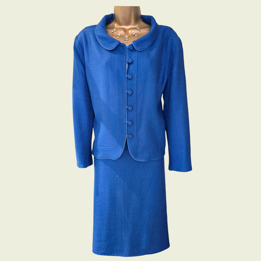 Blue suit on a mannequin against a beige background