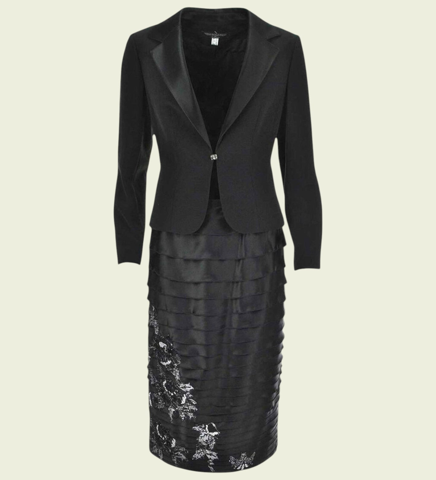 Black suit with a skirt on a beige background