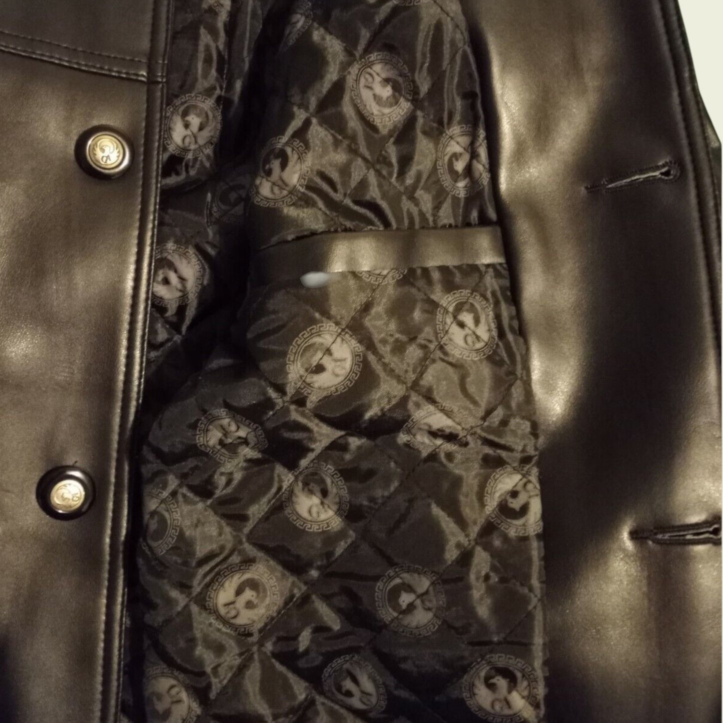 Close-up of a Black leather jacket with intricate patterned lining