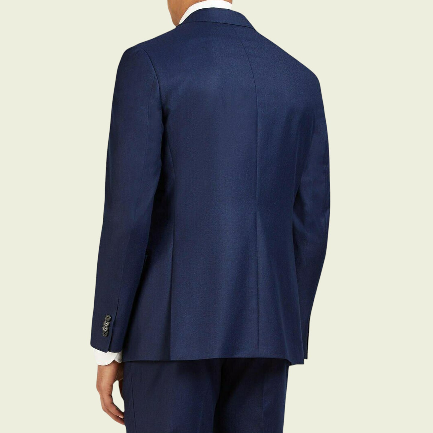 Navy blue suit jacket on a beige background