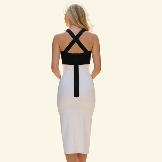 Timelessfashions black and white bodycon dress with crossover back straps and a long front split. Made from polyester and elastane.