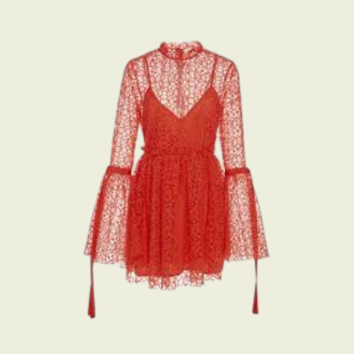 Red lace dress on a beige background