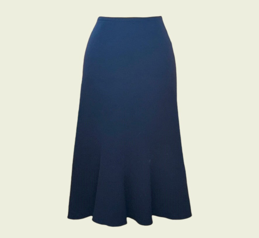 Navy blue skirt on a beige background
