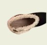 Black suede clog decorative fur on a white background