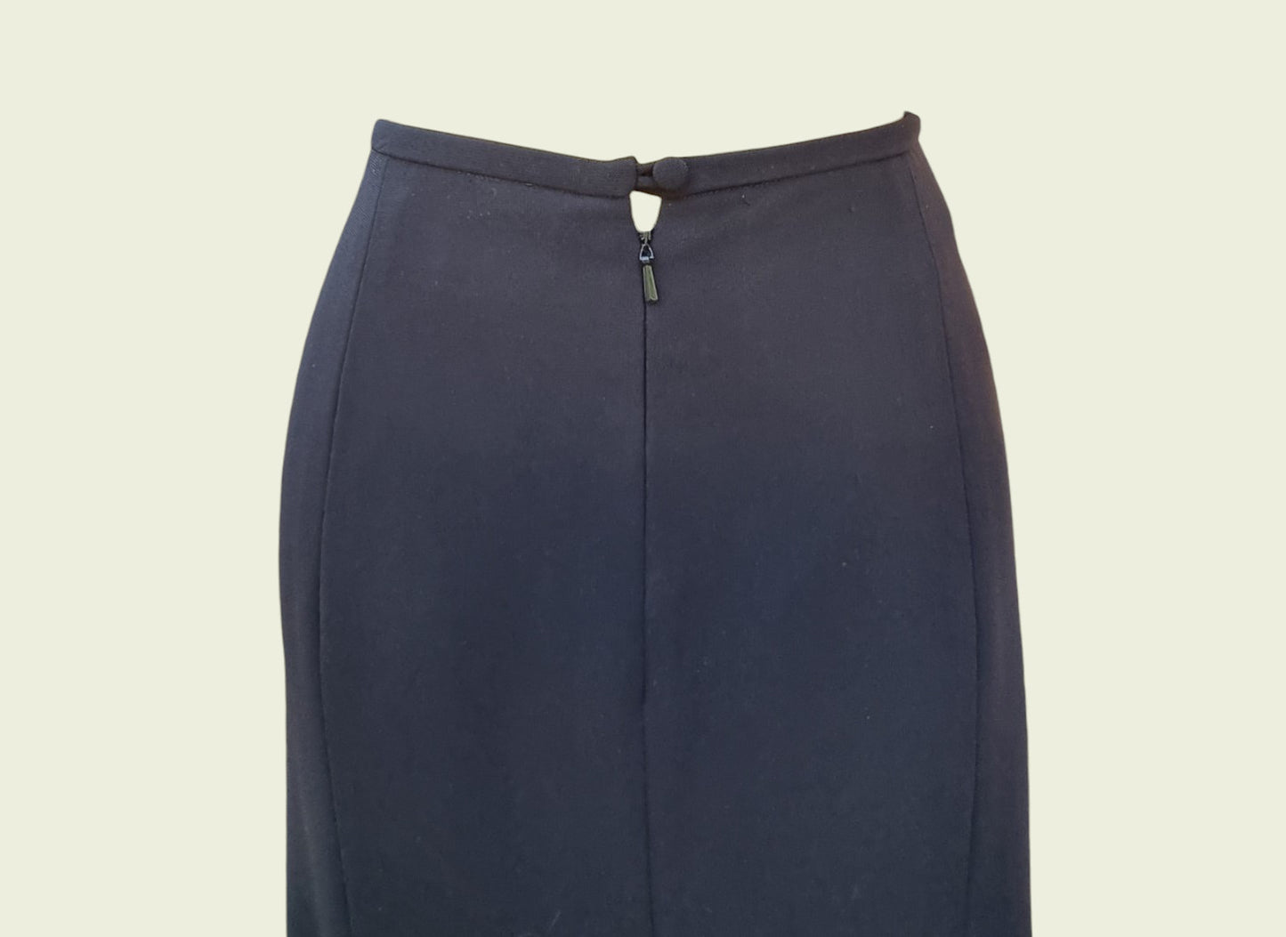 Navy blue skirt on a beige background