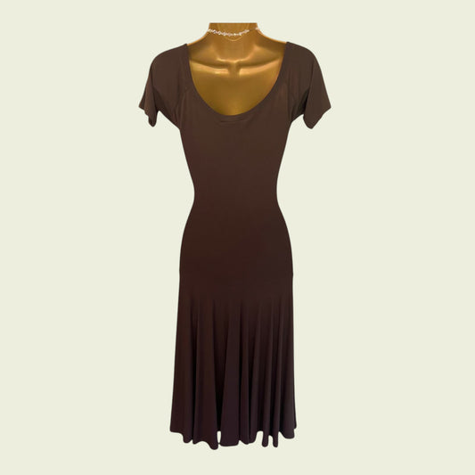 Brown dress on a mannequin against a beige background