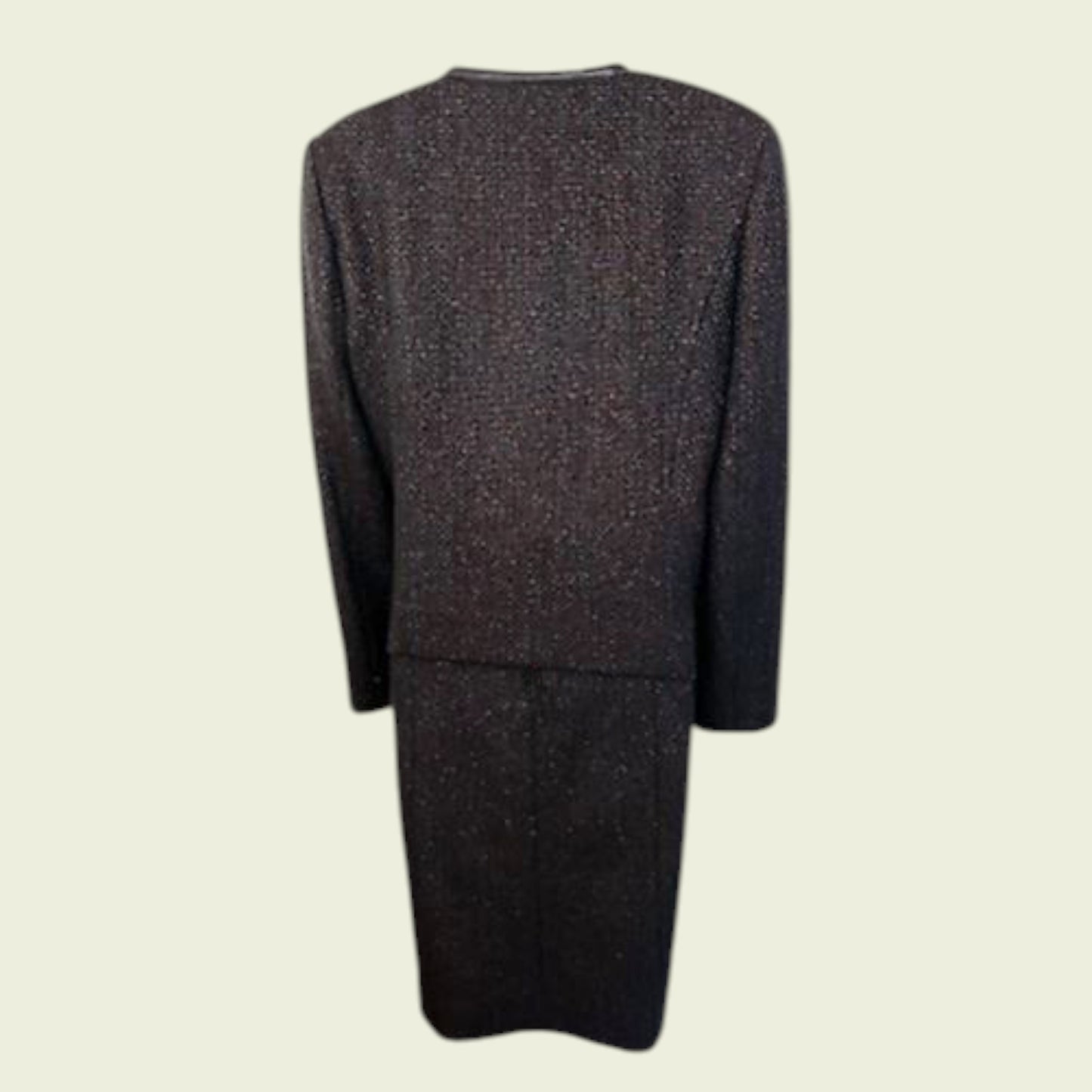 Navy textured dress on a beige background