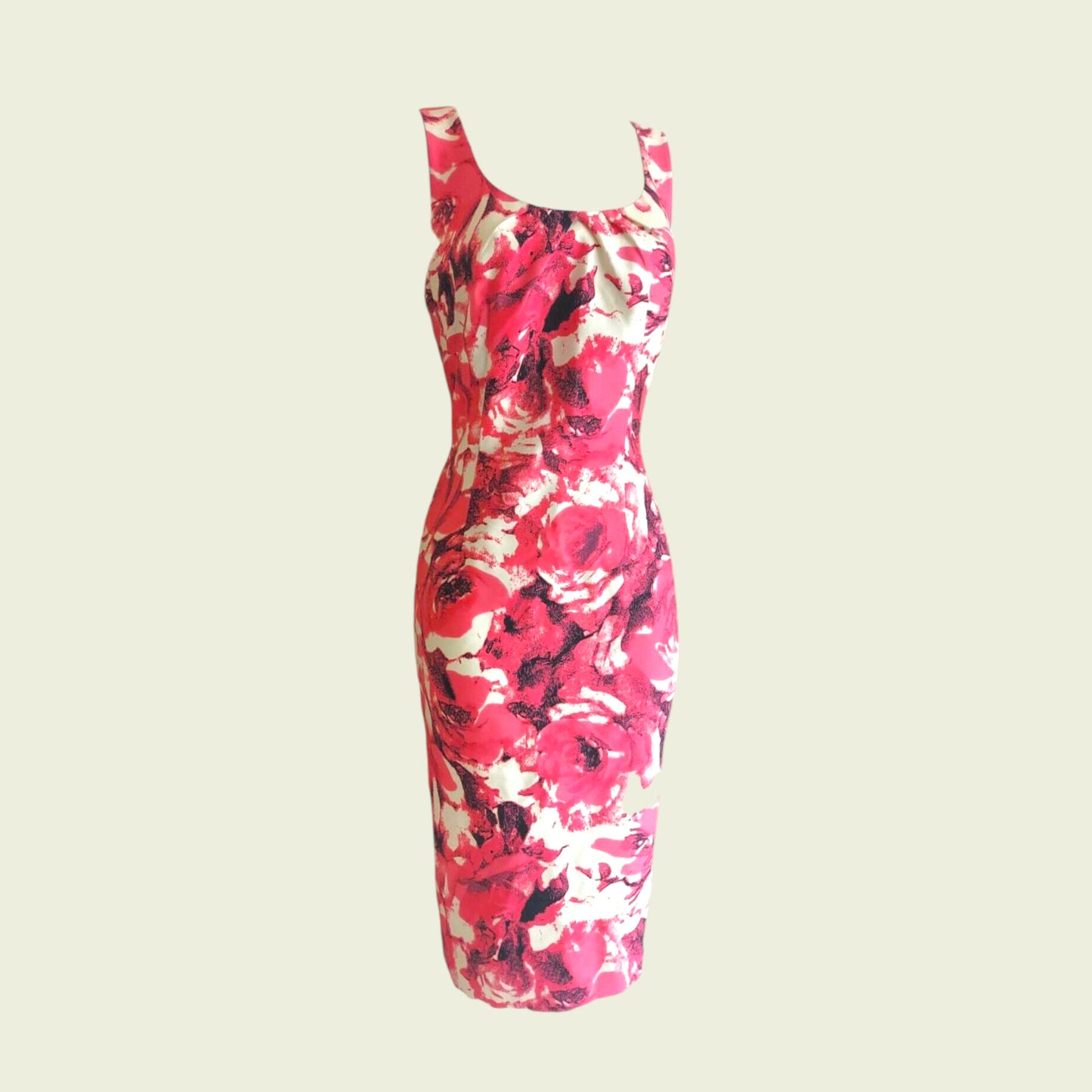 Red floral dress on a beige background