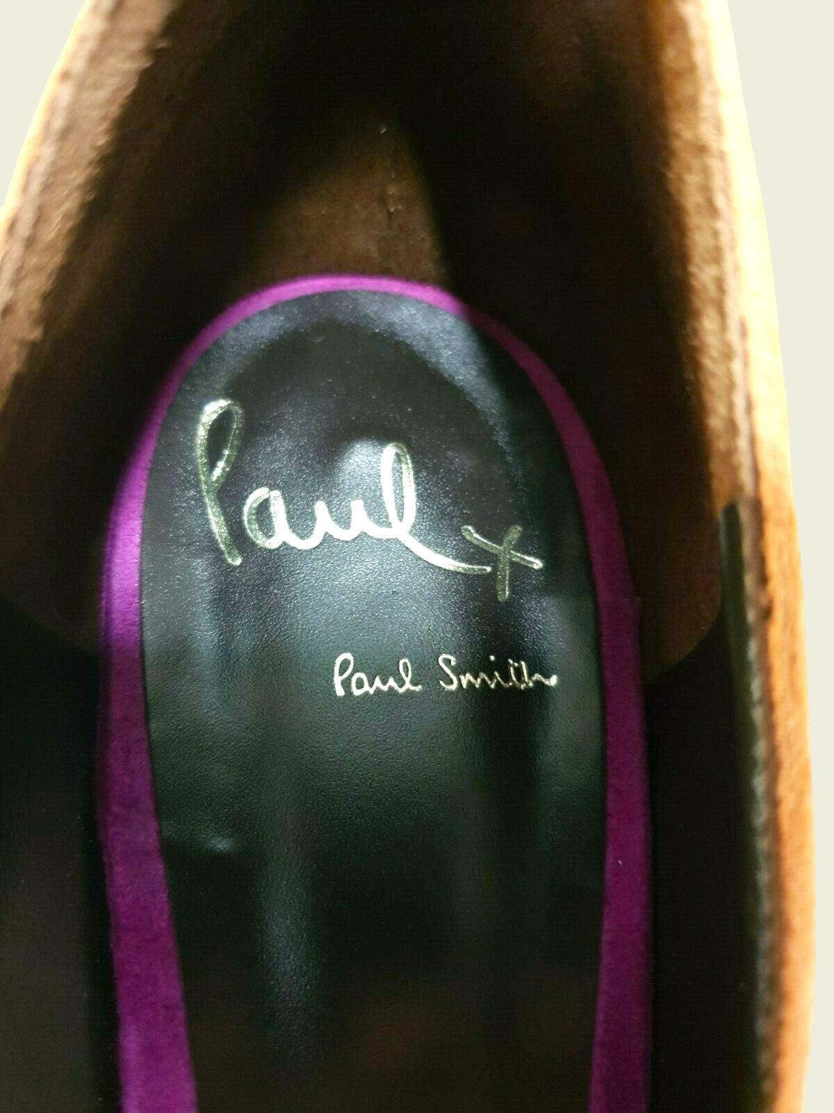 Close-up of a Paul Smith shoe sole with brand name.