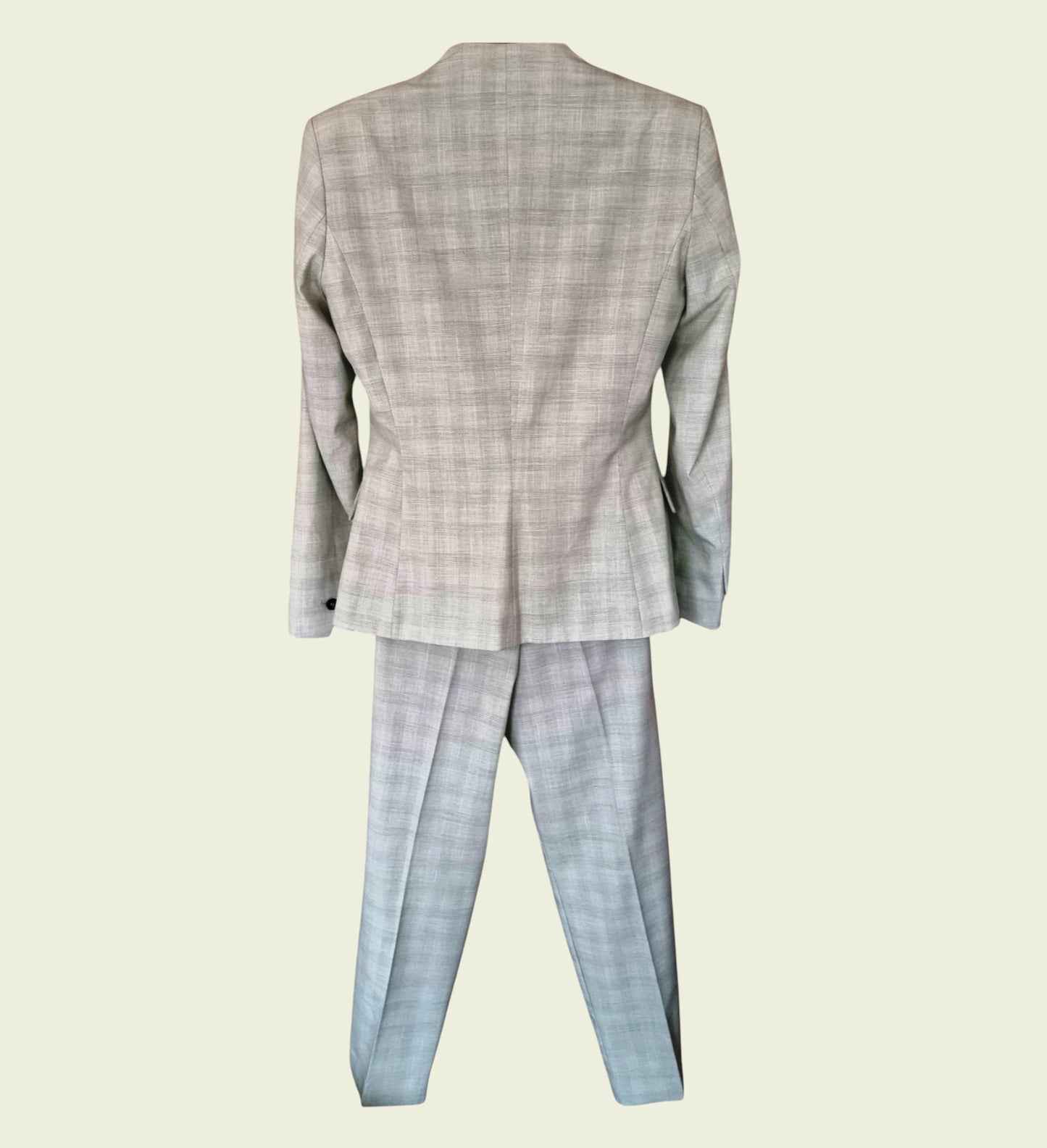 Mint green checkered suit on a white background